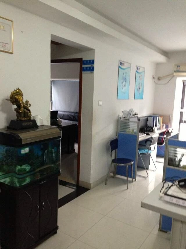 Nuestro traslado a Unit 21K, Block C, Huaqiang Plaza a finales de 2009